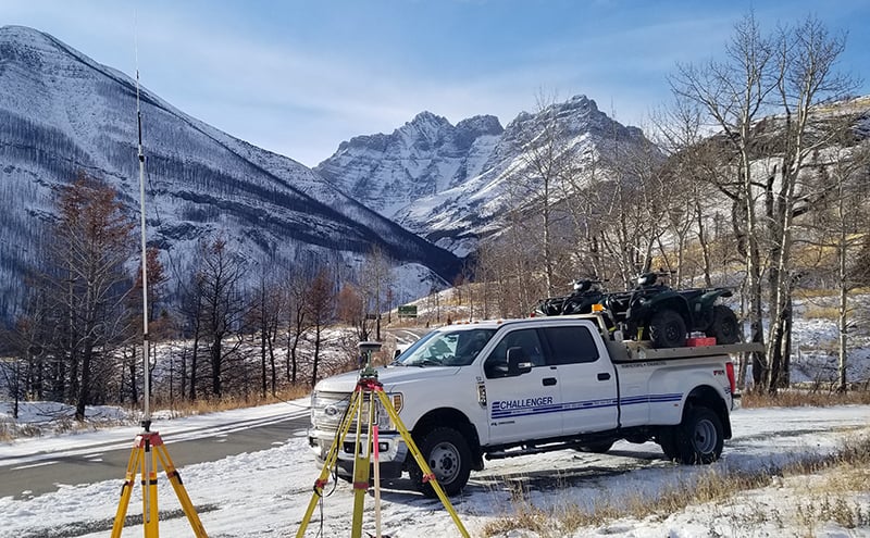 Challenger truck and survey gear in the mountains