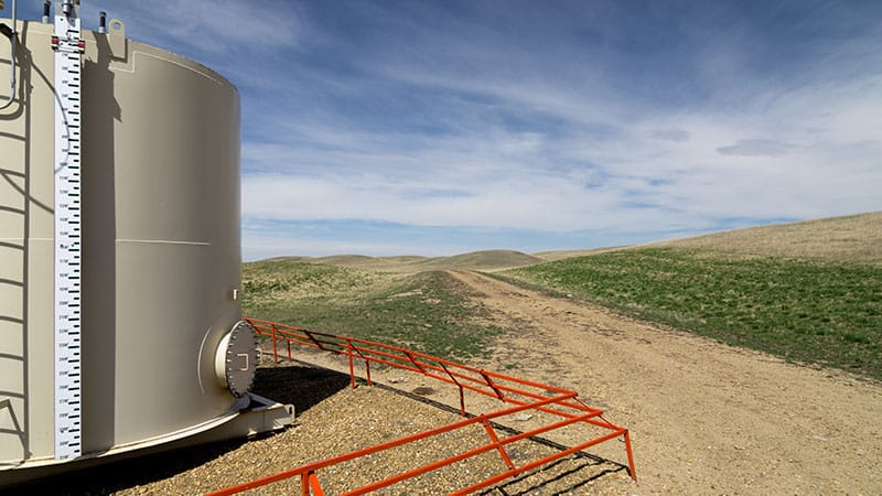 well site tank access road on the prairies