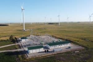 Substation with wind turbines in background
